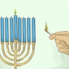 Att tända en hanukkah menorah