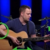 Slå en gitarr