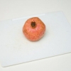 Öppnar ett granatäpple
