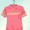 Stryka en skjorta eller t-shirt