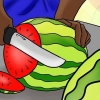 Ett t. Skär rex ur en vattenmelon