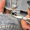 Reparera hål i låren på jeans