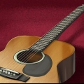 Minska effekten av en akustisk gitarr