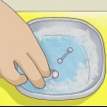 Ta hand om en navelpiercing under din graviditet