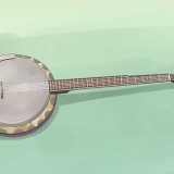 Spelar banjo