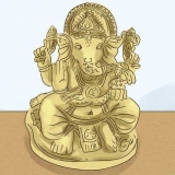 Ber till den hinduiska guden ganesha