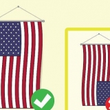 Hängande den amerikanska flaggan vertikalt