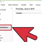 Slå på eller av guiden frånvaro i outlook