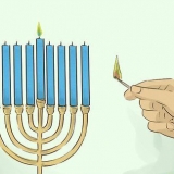 Att tända en hanukkah menorah