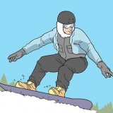 Gör en frontside 360 ​​på en snowboard