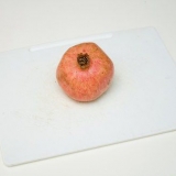Öppnar ett granatäpple