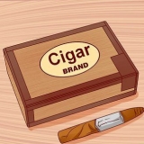 Tända en cigarr