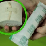 Applicera ett stödbandage på ditt knä