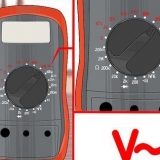 Använder en voltmeter