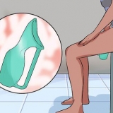 Använder en kvinnlig urinal