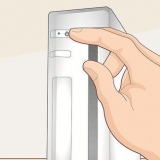 Synkronisera en wii-fjärrkontroll till konsolen