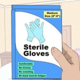 Att ta på sig sterila handskar