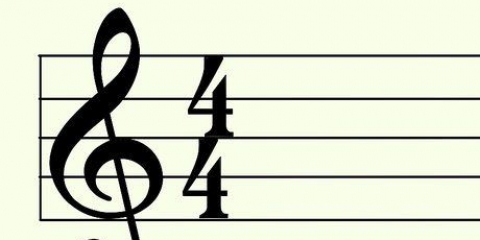 Läser noter för gitarren
