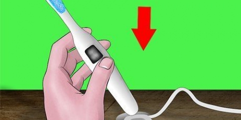 Använda en elektrisk tandborste