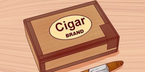 Tända en cigarr