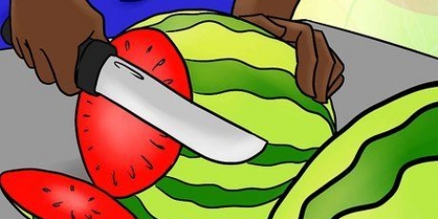 Ett t. Skär rex ur en vattenmelon