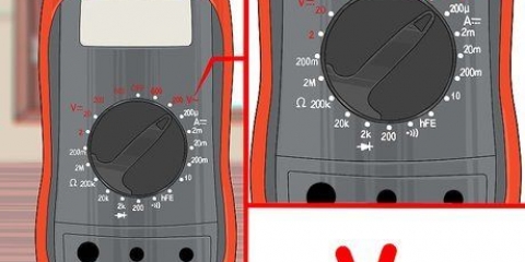 Använder en voltmeter