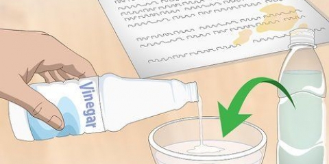 Ta bort oljefläckar från papper