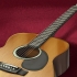 Minska effekten av en akustisk gitarr