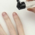Applicera nagelbandsolja