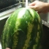 Skära vattenmelon